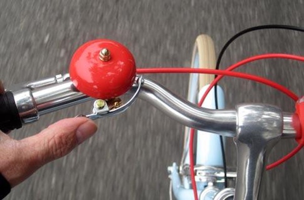 Bell and voice are used for communication by experienced bike riders