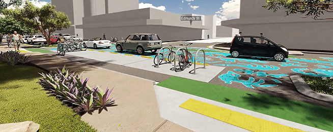 Artist impression of Smith Street upgrade showing a wide footpath with a person riding down a bike lane between the path and new bike parking and car parking at Edmunds Street, also showing new road surface mural.